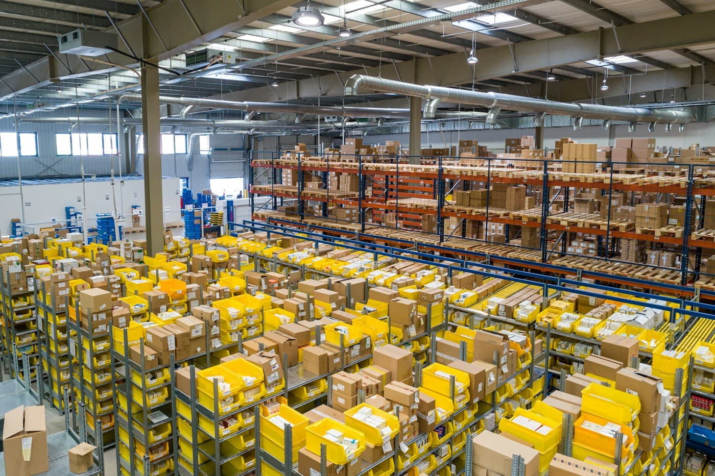Shelving and packed goods in an organized distribution warehouse